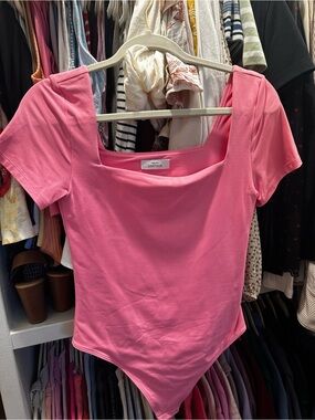 Pink Babaton short sleeve body suit - Size M